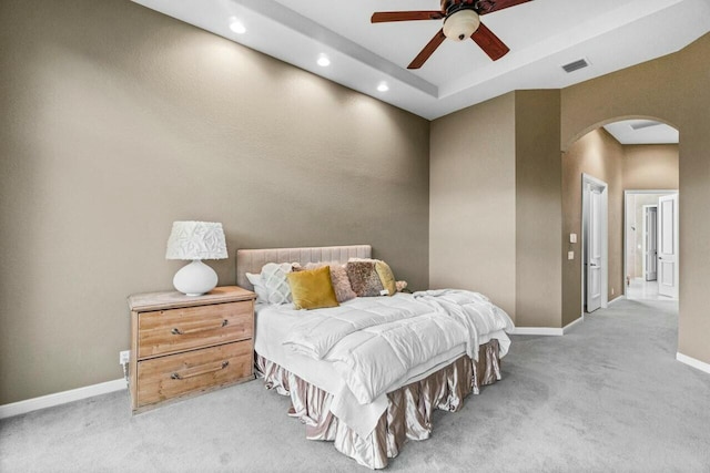 carpeted bedroom with ceiling fan