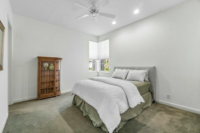 bedroom with ceiling fan and carpet