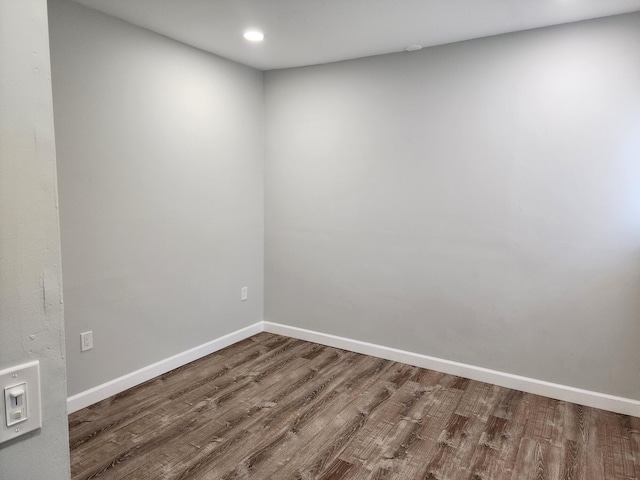 unfurnished room featuring hardwood / wood-style floors