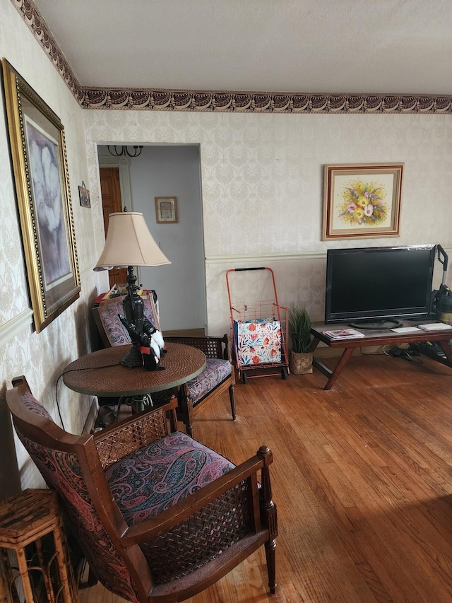 sitting room featuring hardwood / wood-style flooring