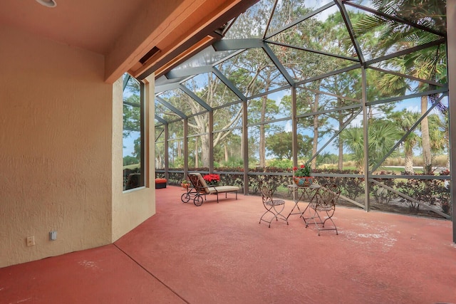 view of patio / terrace with glass enclosure