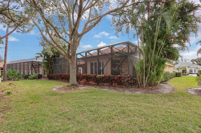 view of yard featuring a lanai