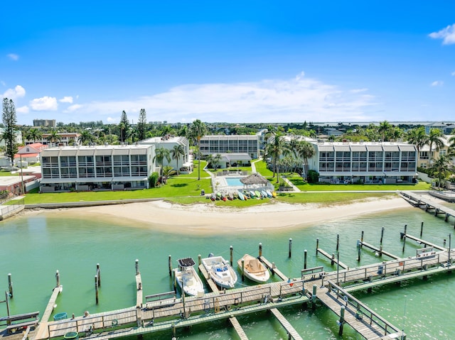 drone / aerial view with a water view and a view of the beach