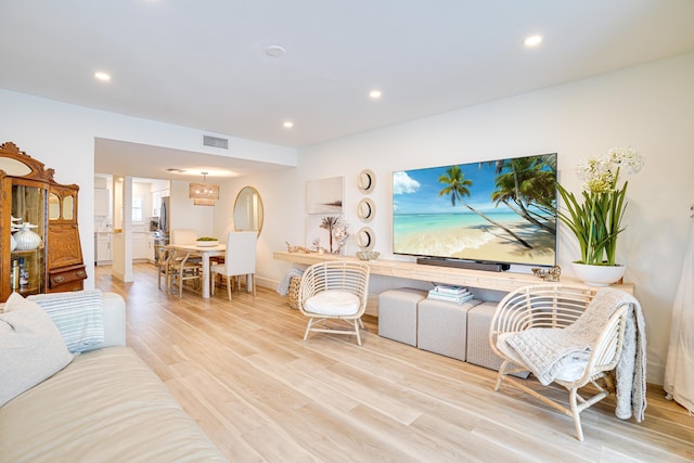 living room featuring light hardwood / wood-style flooring