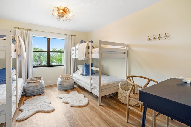 bedroom with wood-type flooring