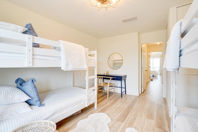 bedroom featuring light hardwood / wood-style floors