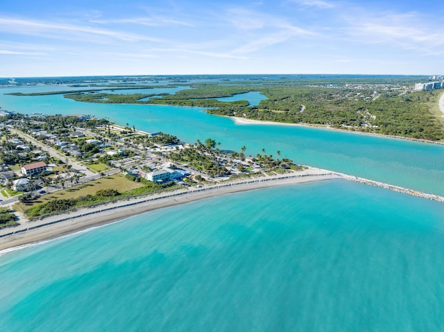 aerial view with a beach view and a water view