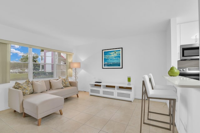 living room with light tile patterned floors