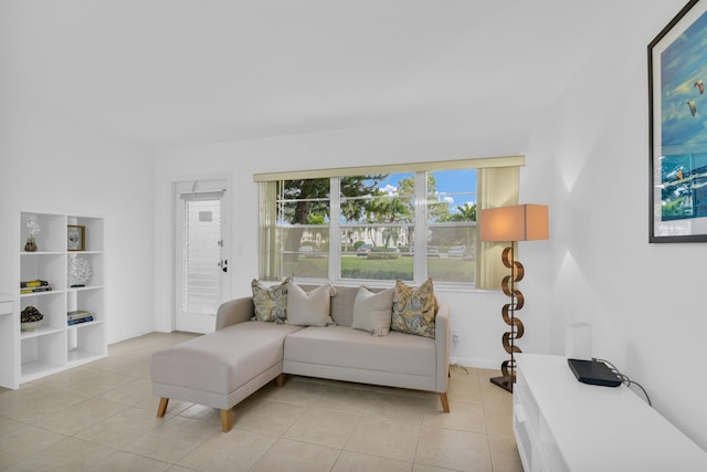 living room with light tile patterned floors