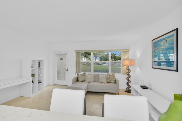 living room featuring light tile patterned floors