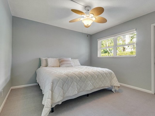 bedroom featuring carpet flooring and ceiling fan