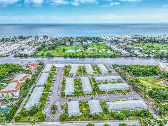 drone / aerial view with a water view