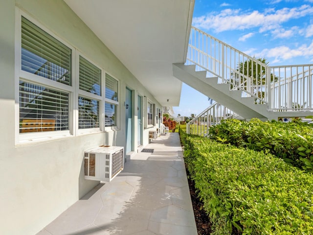 view of patio featuring a wall mounted AC