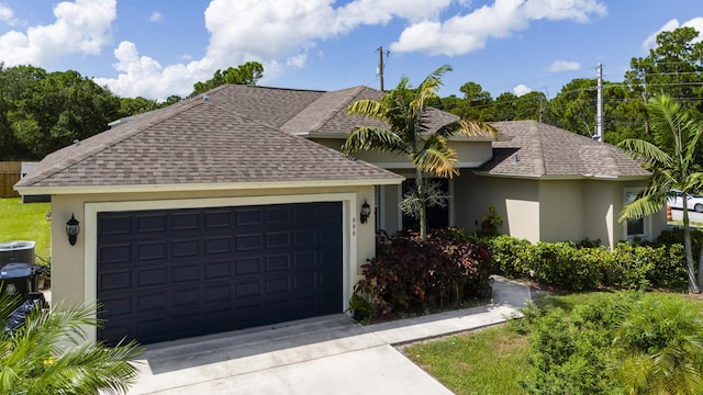 single story home with a garage