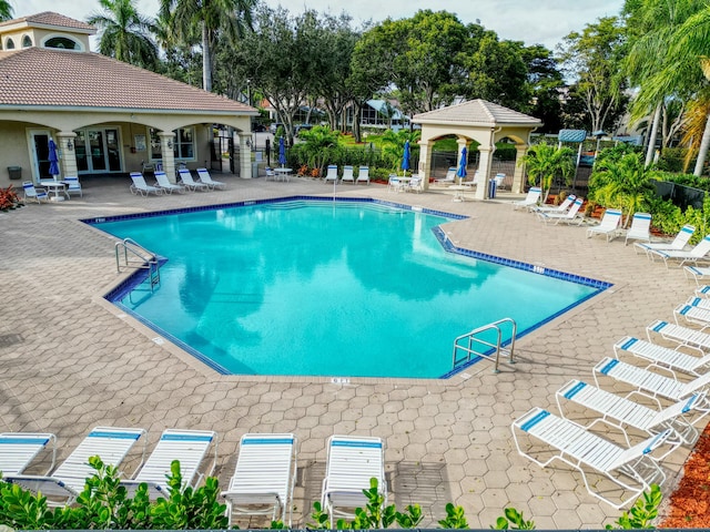 view of pool with a gazebo and a patio area