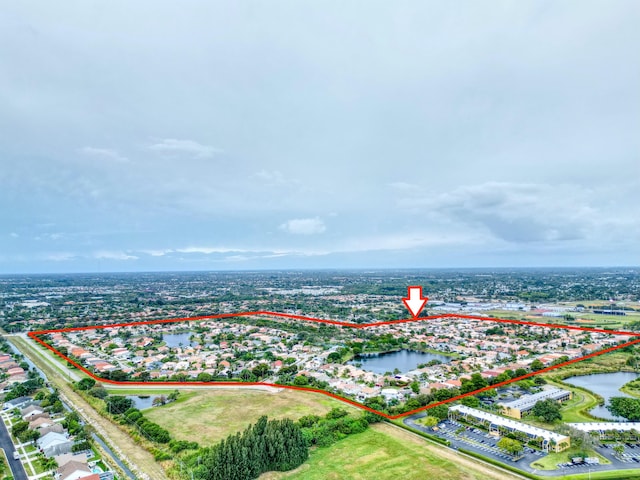 aerial view featuring a water view