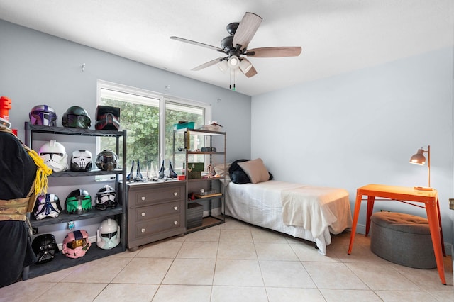 bedroom featuring ceiling fan and light tile patterned floors