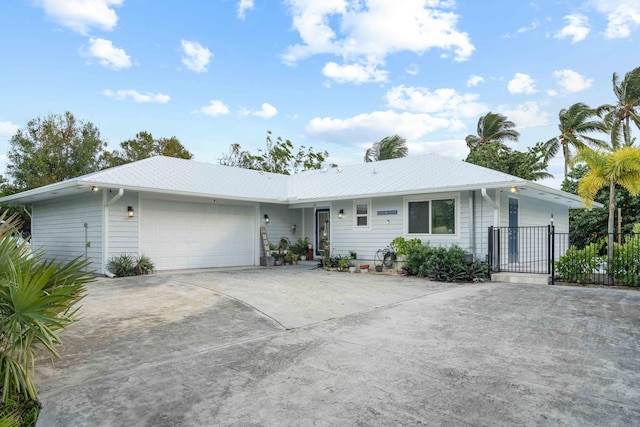 single story home with a garage