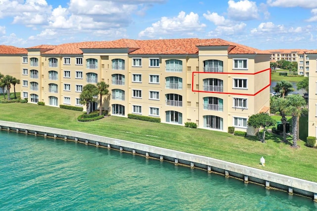 view of property with a water view