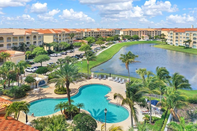 view of pool with a water view