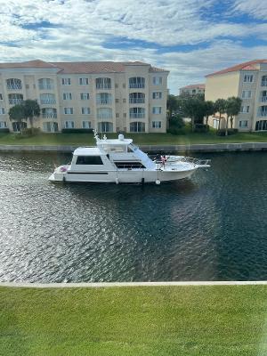 dock area featuring a water view and a yard