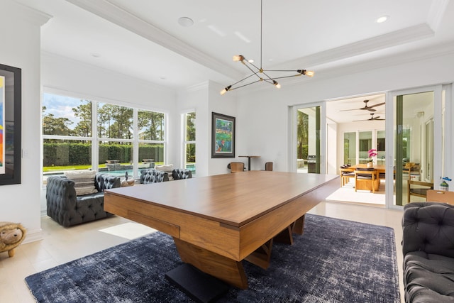 dining room featuring crown molding, ceiling fan with notable chandelier, and french doors