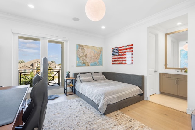 bedroom with ensuite bath, crown molding, light hardwood / wood-style flooring, and access to outside