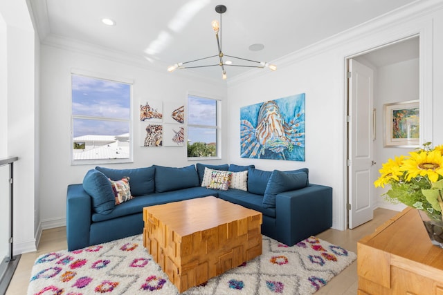 living room with ornamental molding and a chandelier