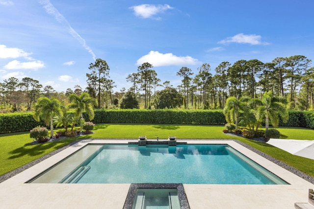 view of pool with a lawn