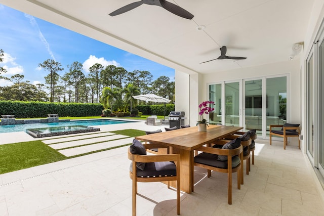 view of patio featuring grilling area, a fenced in pool, outdoor lounge area, and ceiling fan