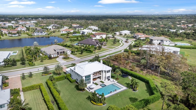 bird's eye view with a water view