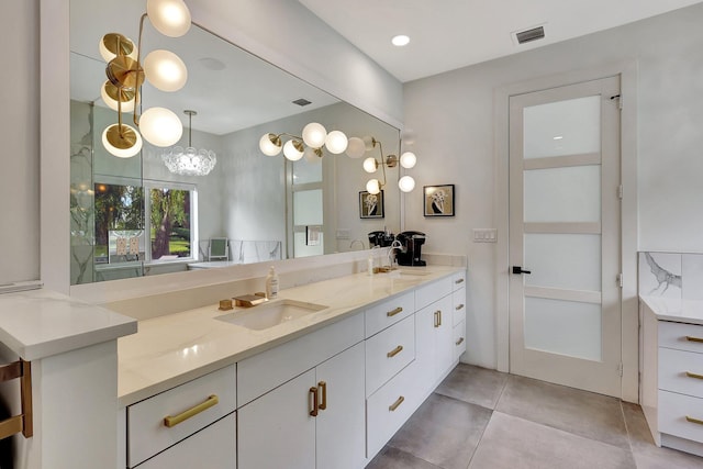 bathroom featuring tile patterned floors and vanity