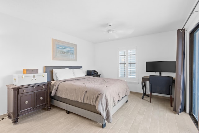 bedroom featuring light hardwood / wood-style flooring and ceiling fan