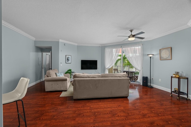 living room with ornamental molding, a textured ceiling, ceiling fan, and dark wood-type flooring