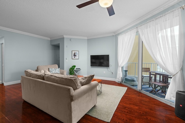 living room featuring ceiling fan, crown molding, and dark hardwood / wood-style floors