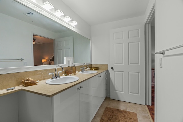 bathroom featuring tile patterned flooring, ceiling fan, and vanity