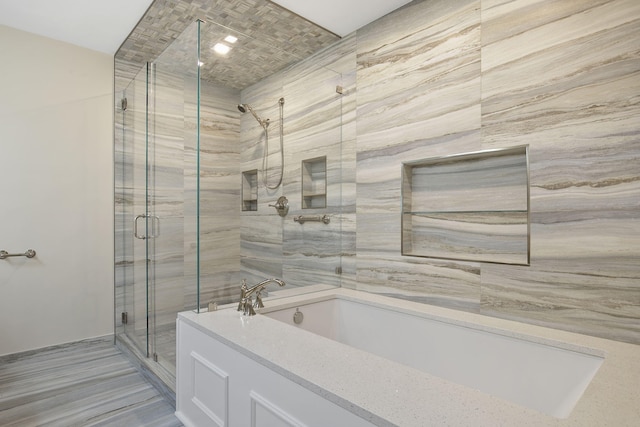 bathroom with independent shower and bath