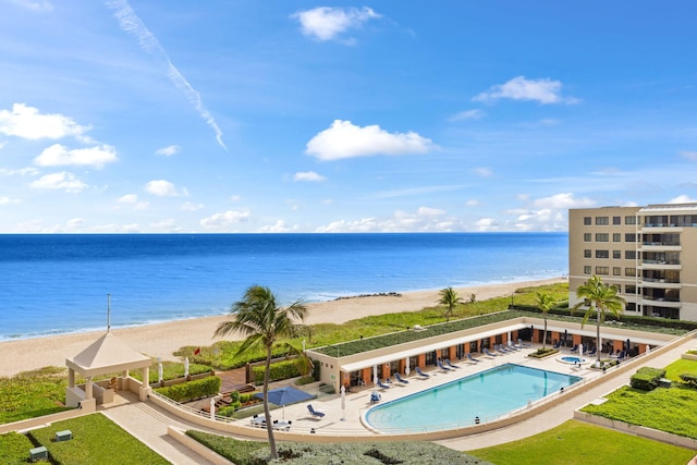 view of water feature featuring a gazebo and a beach view