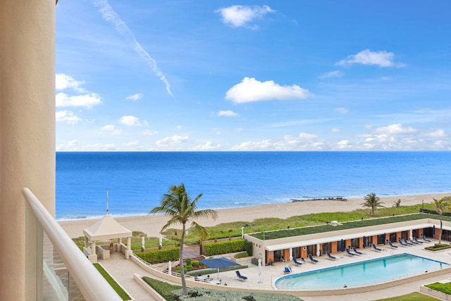 view of water feature featuring a view of the beach and a gazebo