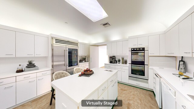 spacious closet featuring light carpet