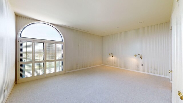 hall with light tile patterned floors