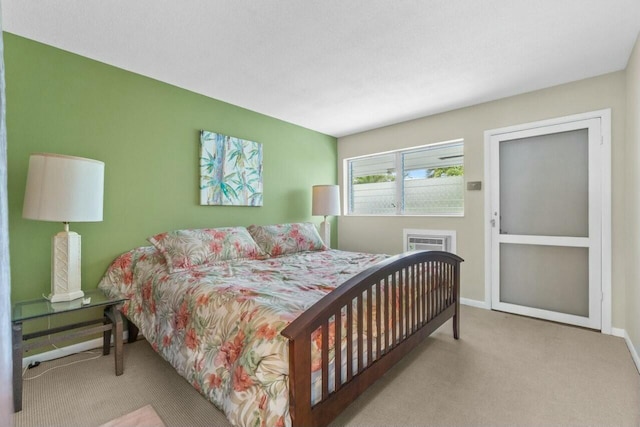 bedroom featuring light colored carpet