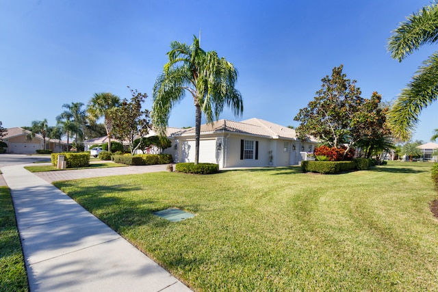 view of yard featuring a garage