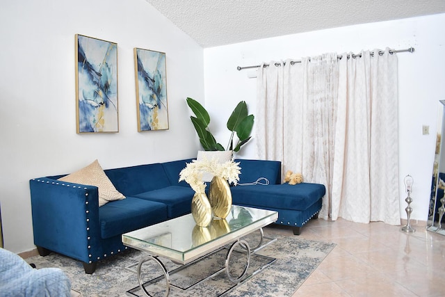 tiled living room with a textured ceiling and vaulted ceiling