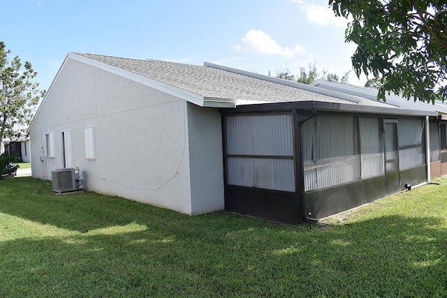 view of property exterior featuring a yard and cooling unit