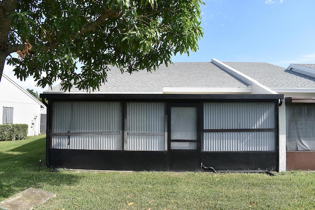 view of home's exterior featuring a yard