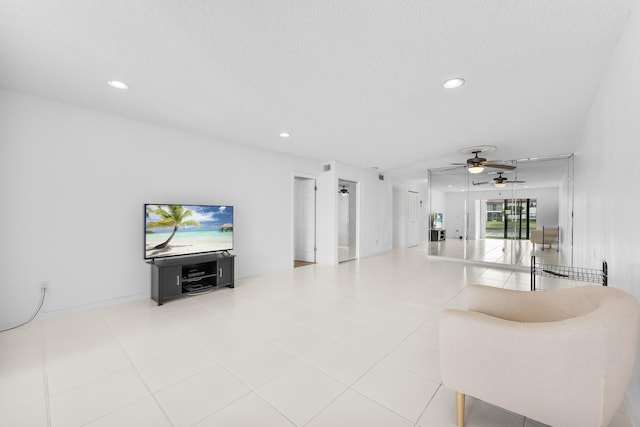 living room featuring ceiling fan