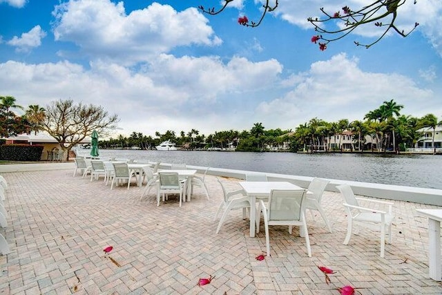 view of patio / terrace with a water view