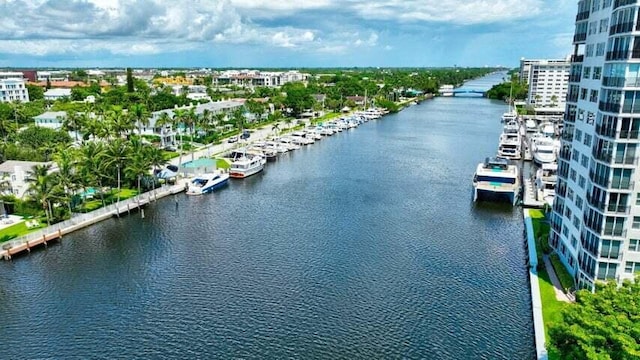 birds eye view of property featuring a water view