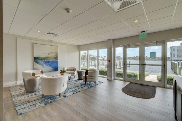 building lobby featuring a water view